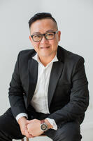 JUSTIN TAN
