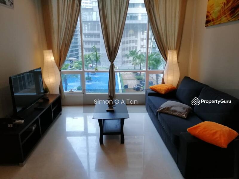 relax in spacious living room with pool view, TV