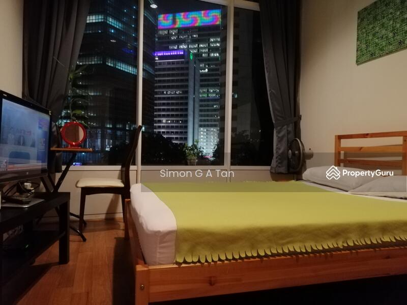 Room 2 has queen bed, TV, air con, wardrobe and stunning view of KLCC skyline