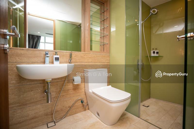 spacious bathroom with hot water to basin, rain shower and hand held shower