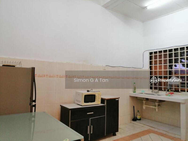 Kitchen with fridge freezer, cabinet, sink