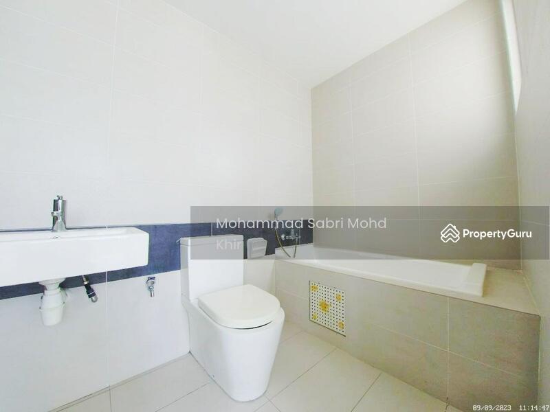 Toilet with bath tub.