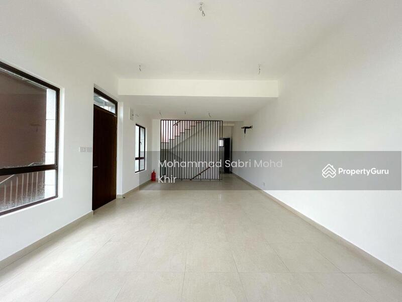 First floor: Dining area, staicase and kitchen at the back. 