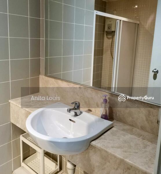 Large mirror and counter top in bathroom
