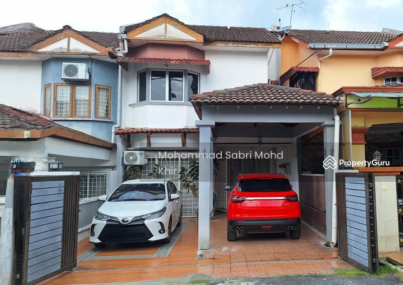 House front view with auto gate. Can park 2 cars. 