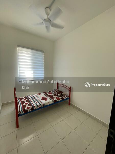 Ground floor: Bedroom with bed and ceiling fan installed. 