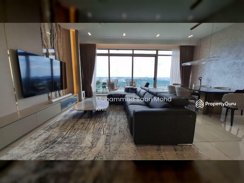 Living area with TV and sofa. 