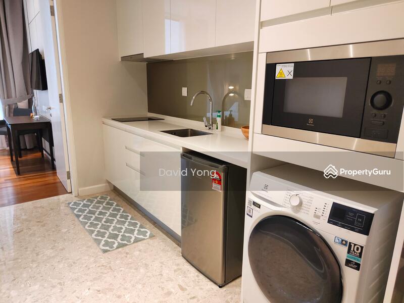 Fully Fitted Kitchen with mini fridge, microwave oven and washer cum dryer