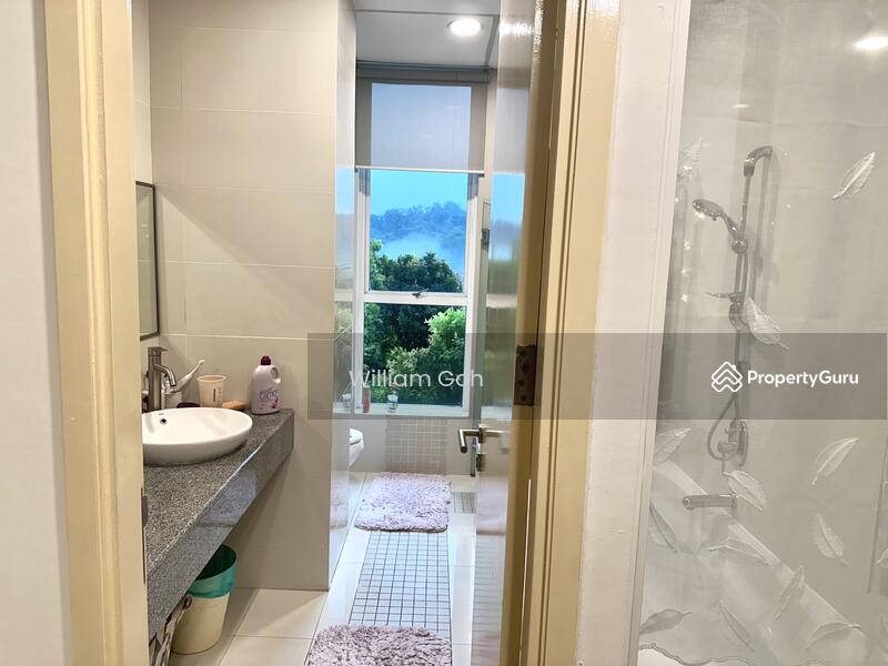 Spacious Master bathroom with bathtub and standing shower with view of the hills and greens