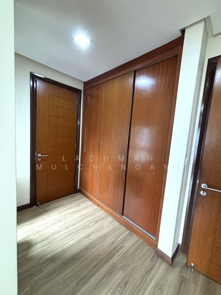 Condominium for Sale at The Capsquare Residences - Lachman Mulchandani - Master bedroom wardrobe - PropertyGuru.com.my