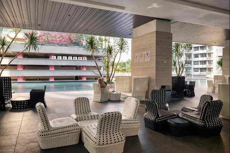 Condominium for Sale at The Elements - Teddy Chin - Pool side seating - PropertyGuru.com.my